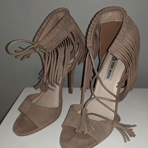Nude fringe heels